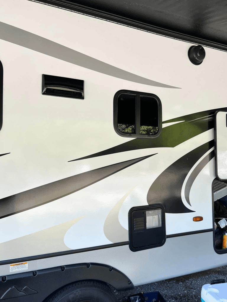 Clean RV exterior after professional pressure washing